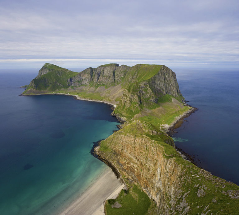 View from the top of Værøy toward Måstad, an abanonded village known as the last refuge for the puffin dog. Now this characteristic dog has been saved Bård Løken