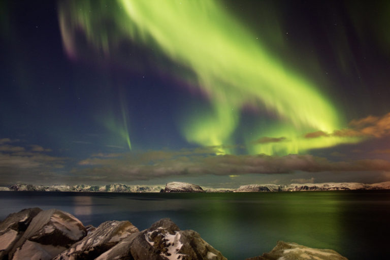Northern Lights over Sørøya Island, seen from the city of Hammerfest © Ziggi Wantuch