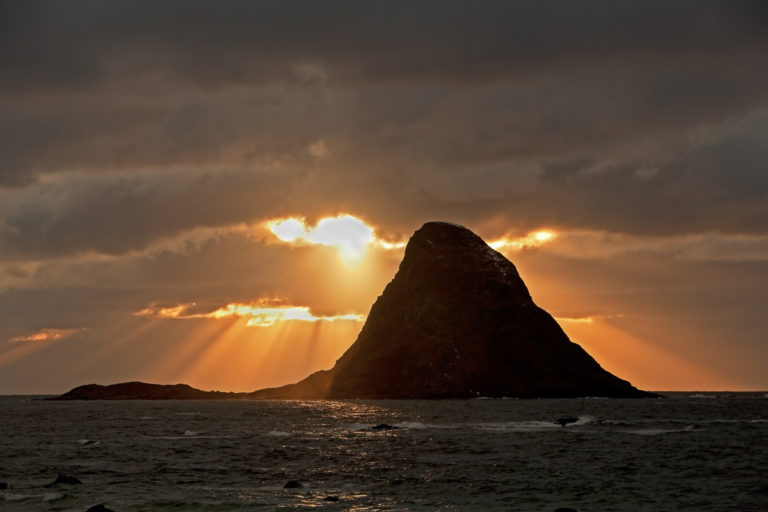 The Midnight Sun playing with the clouds at Bleiksøya Island © Marten Bril
