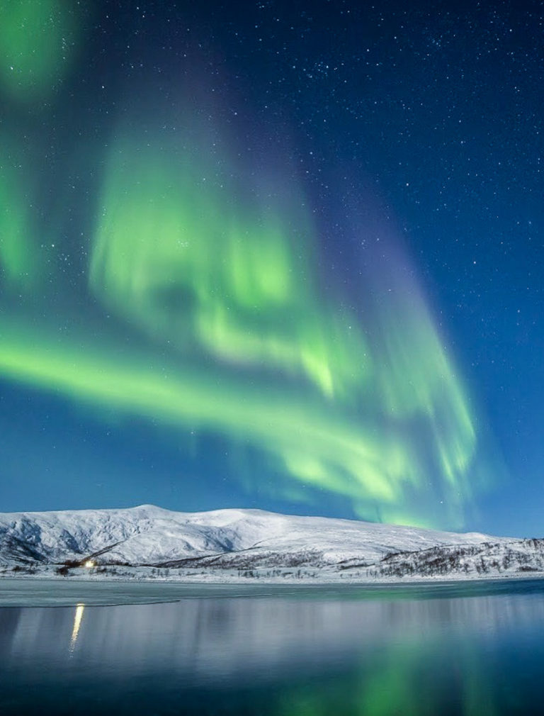 Figure 4c - Spring 2019 auroras lighting up a moonlit landscape © William Copeland