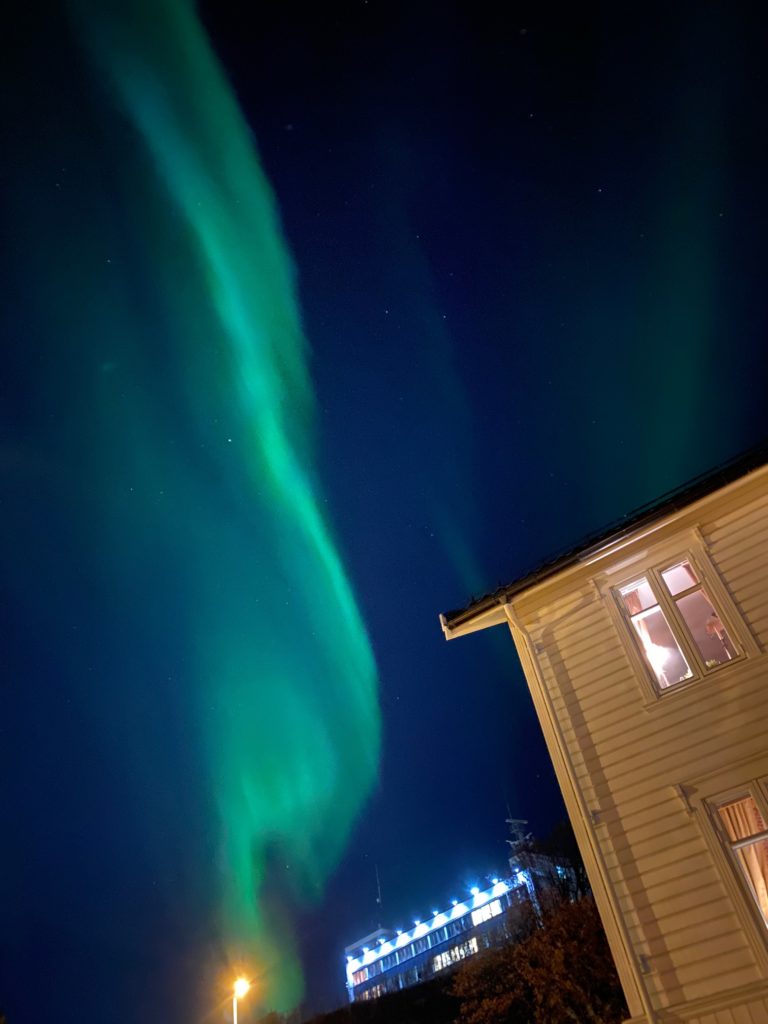 The northern lights in the centre of town taking with phone camera © Knut Hansvold
