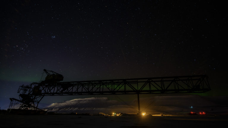 The Northern Lights and old mining installation © Jarle Røssland