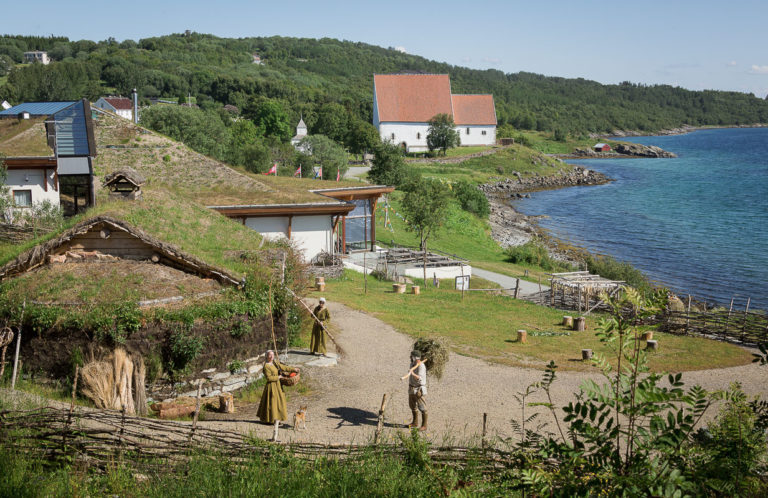 View from the medaeval farm past the Trondenes Historic Centre to the Church of Trondenes © Harriet M. Olsen/Sør-Troms museum