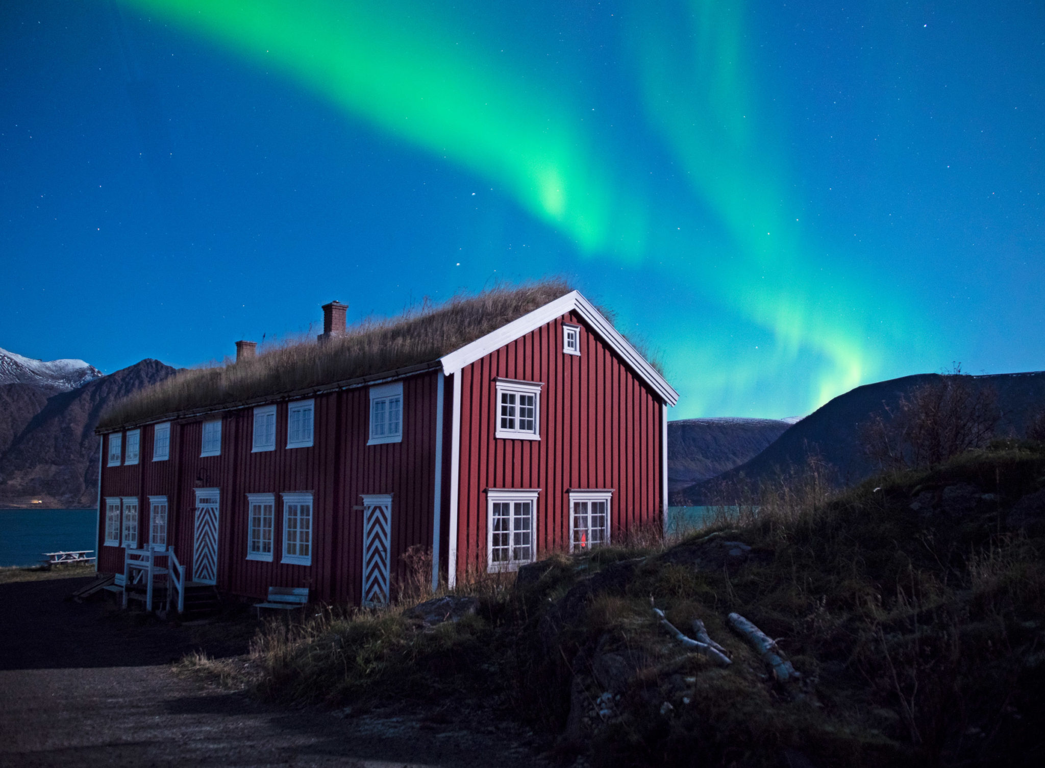 A late autumn night, there are northern lights over the 18th c. farmhouse of Elgsnes © Jan Schmitt