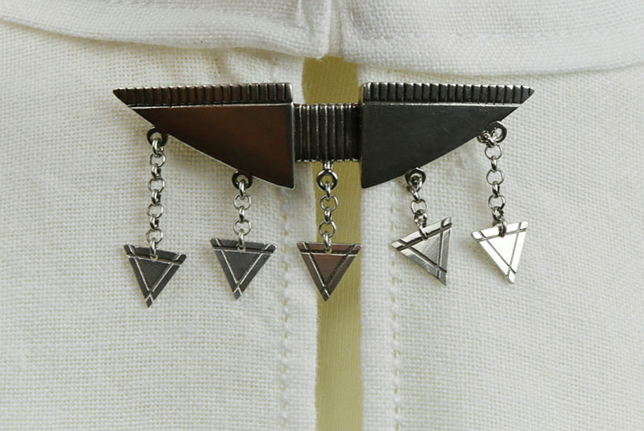 The ornament on the Kven costume for men is inspired by boat shapes and water bailers © Vadsø museum - Ruija kvenmuseum