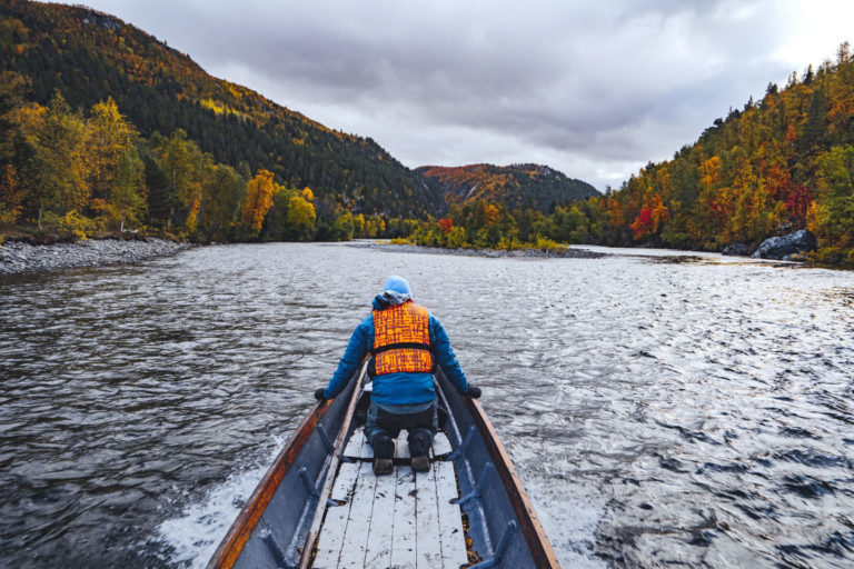Slender, traditional boats take you up the Reisadalen Valley towards the waterfalls © Petr Pavlíček