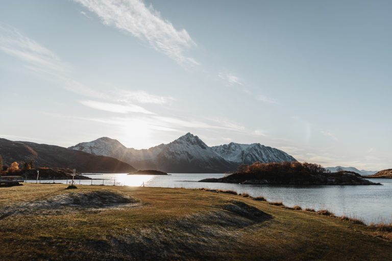 View from Øvergårdsvika bay towards Grytøya island in the south. In the hill above graves and boat houses can be detected in the terrain © André Askeland