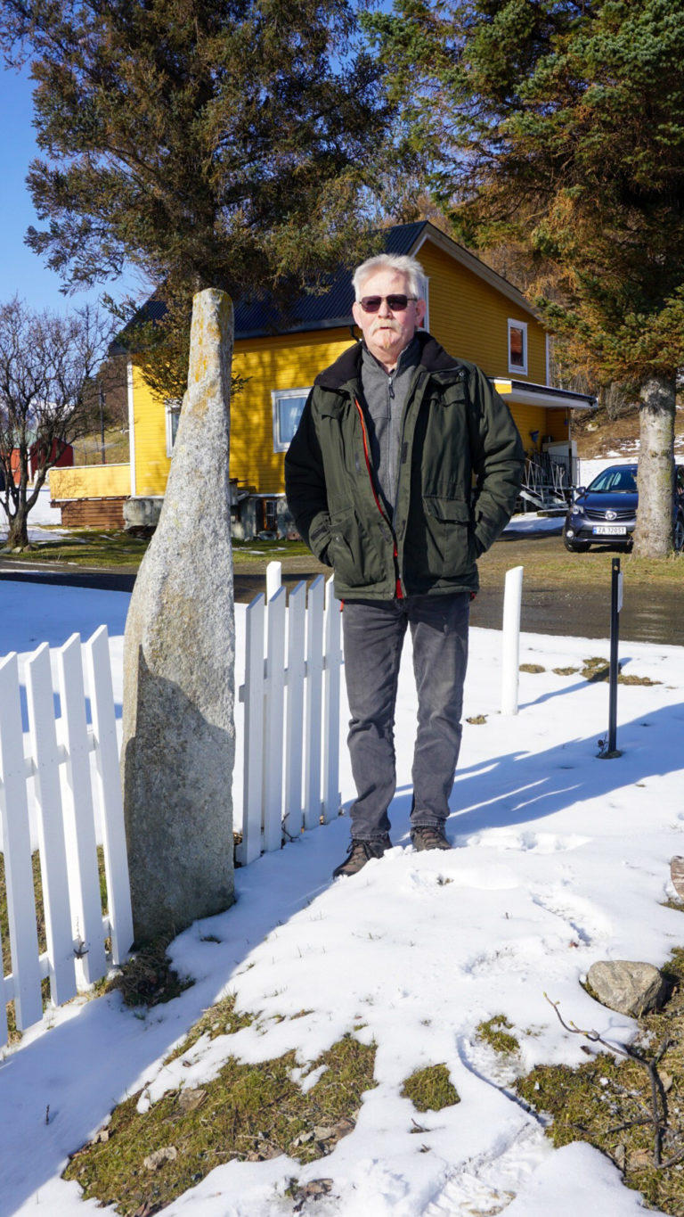 Bjørn Johannessen was my guide at Bjarkøy Island. Here at "Pila" - the arrow - a standing stone from the iron age © Knut Hansvold