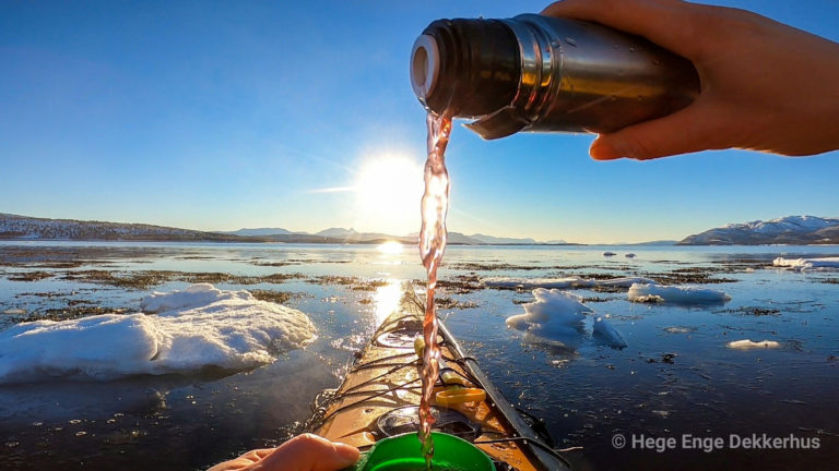 Kayak coffee in winter sunshine in Tranøybotn © Norwegian Wild