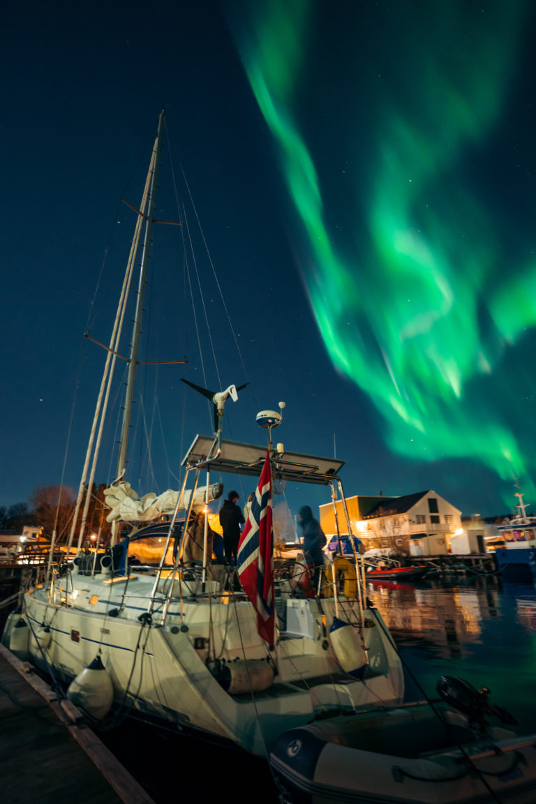 The skipper himself, Halvard, smoking a pipe and looking at the lightshow © Ann-Helen Elstad (the skippers better half :-))