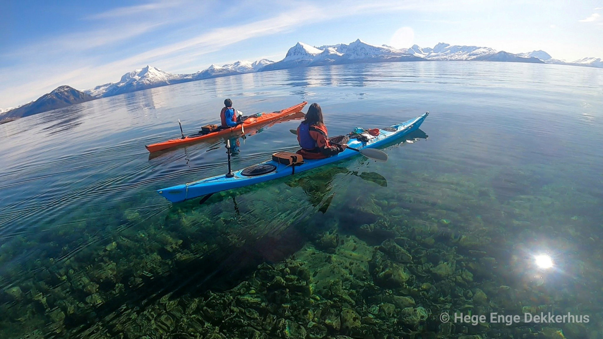 The bright sun of late winter is refracted in the sea, created the aqua colour © Norwegian Wild