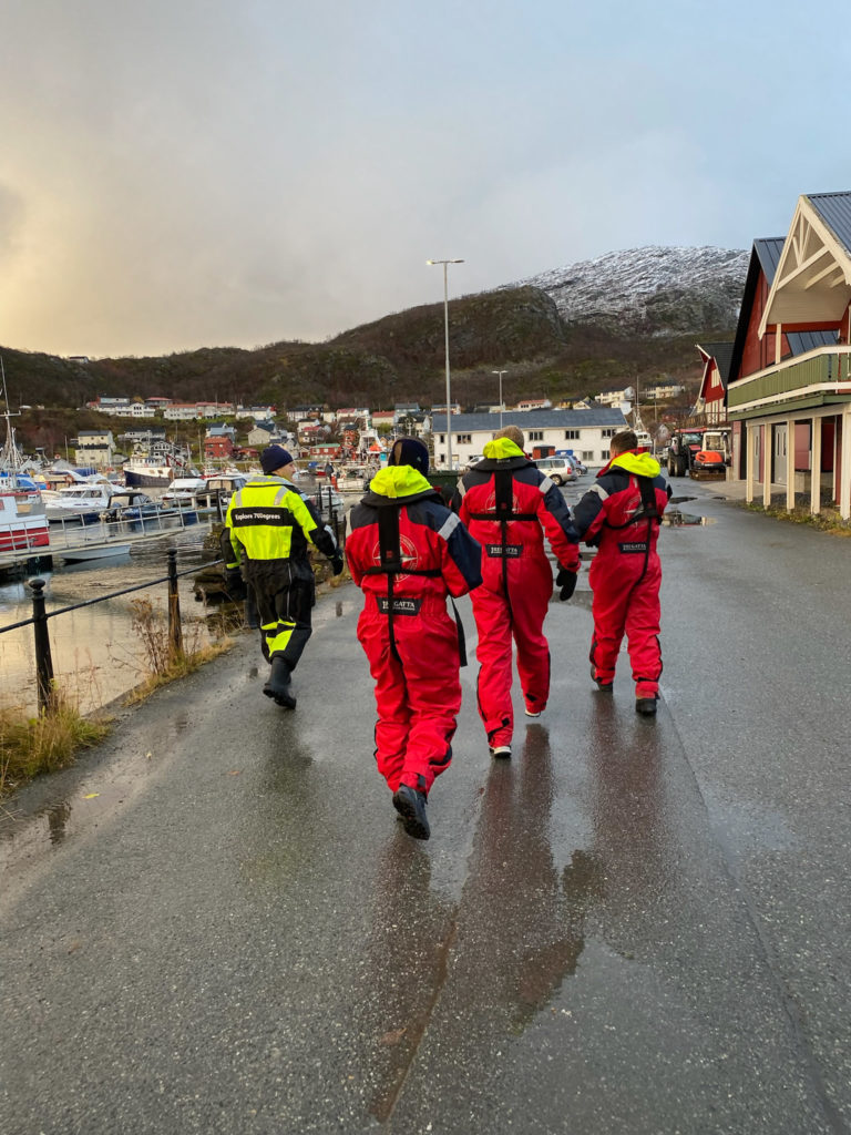 A 300 metre walk through Skjervøy's village centre to get from the dressing room to the boat © Explore 70 Degrees