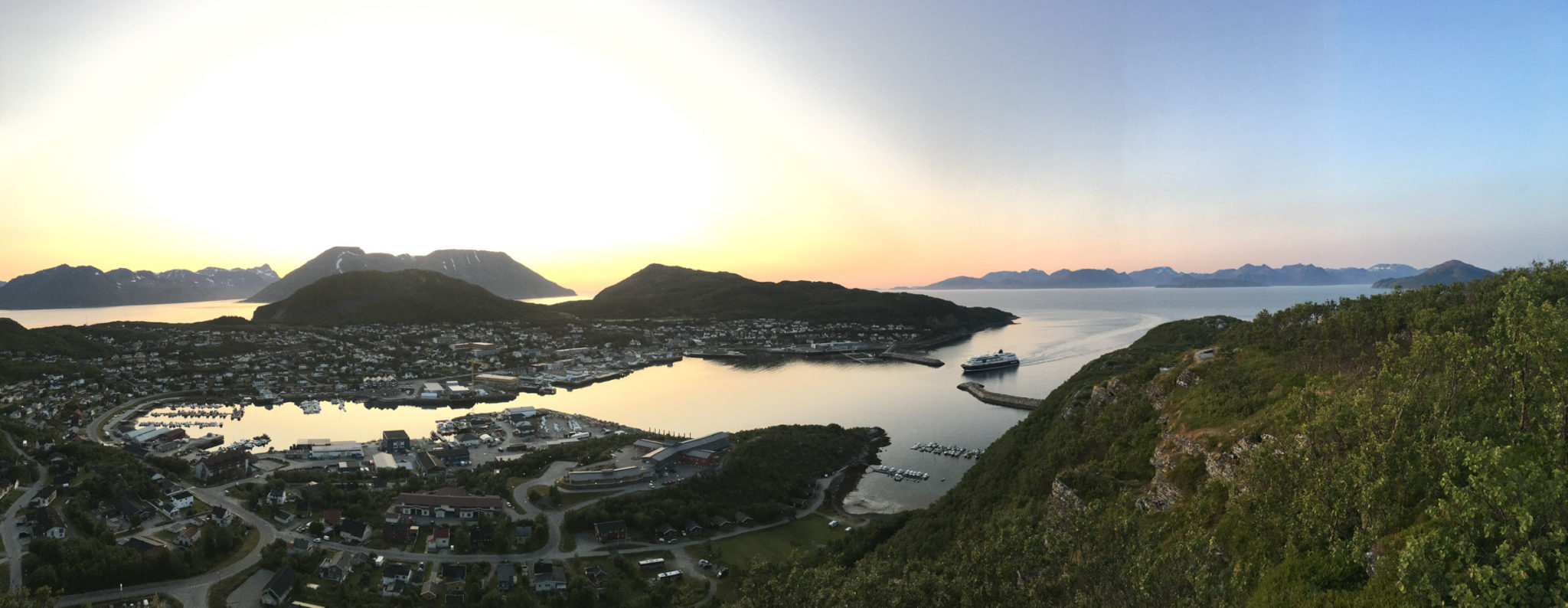 The Hurtigruten ship about to call at Skjervøy in the evening © Explore 70 Degrees